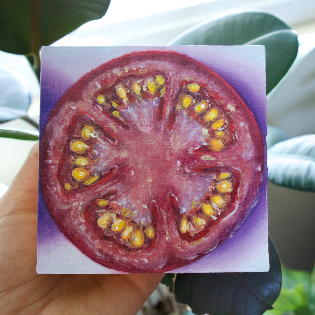 Tomato with purple background